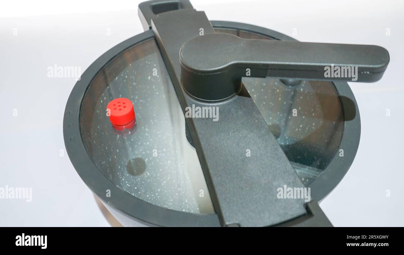 The Gray Granite Non-Stick Cooking Pot is a durable and efficient kitchen tool for all your cooking needs. The Gray Granite Non-Stick Cooking Pot is a Stock Photo