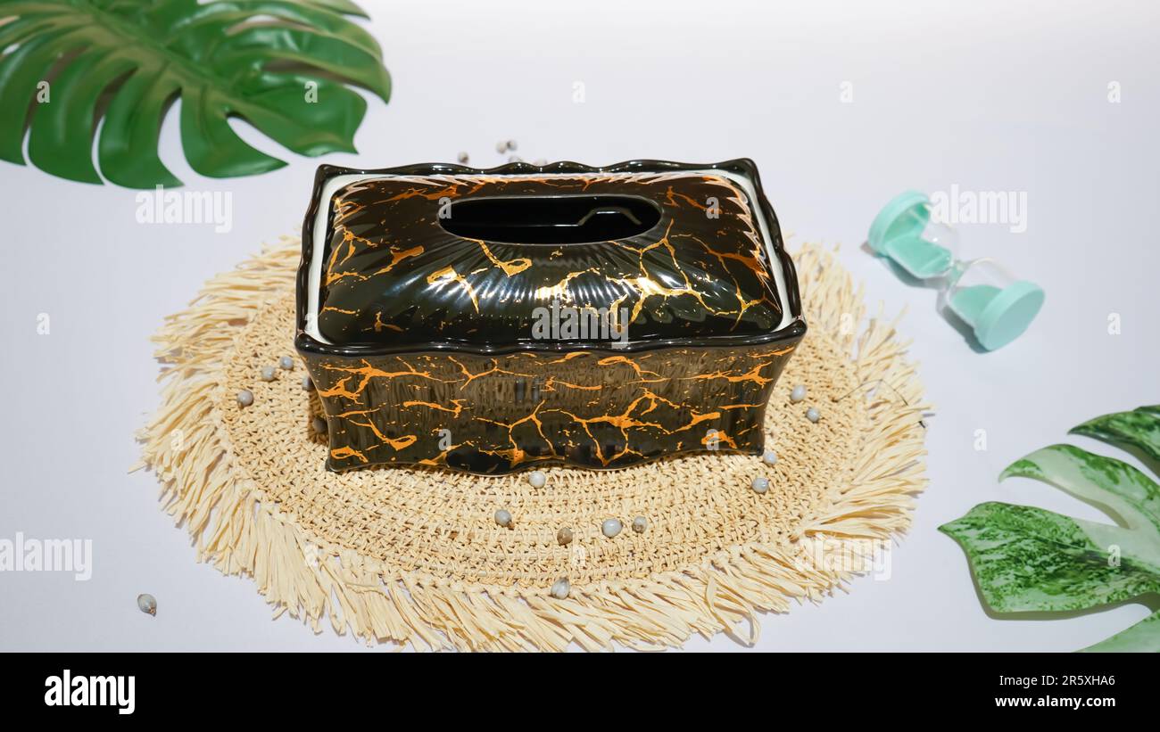 This elegant black ceramic tissue holder is the perfect addition to any