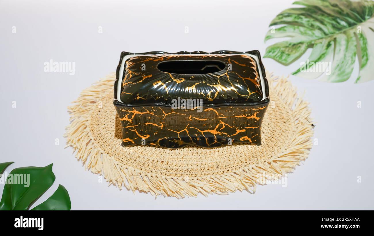 This elegant black ceramic tissue holder is the perfect addition to any