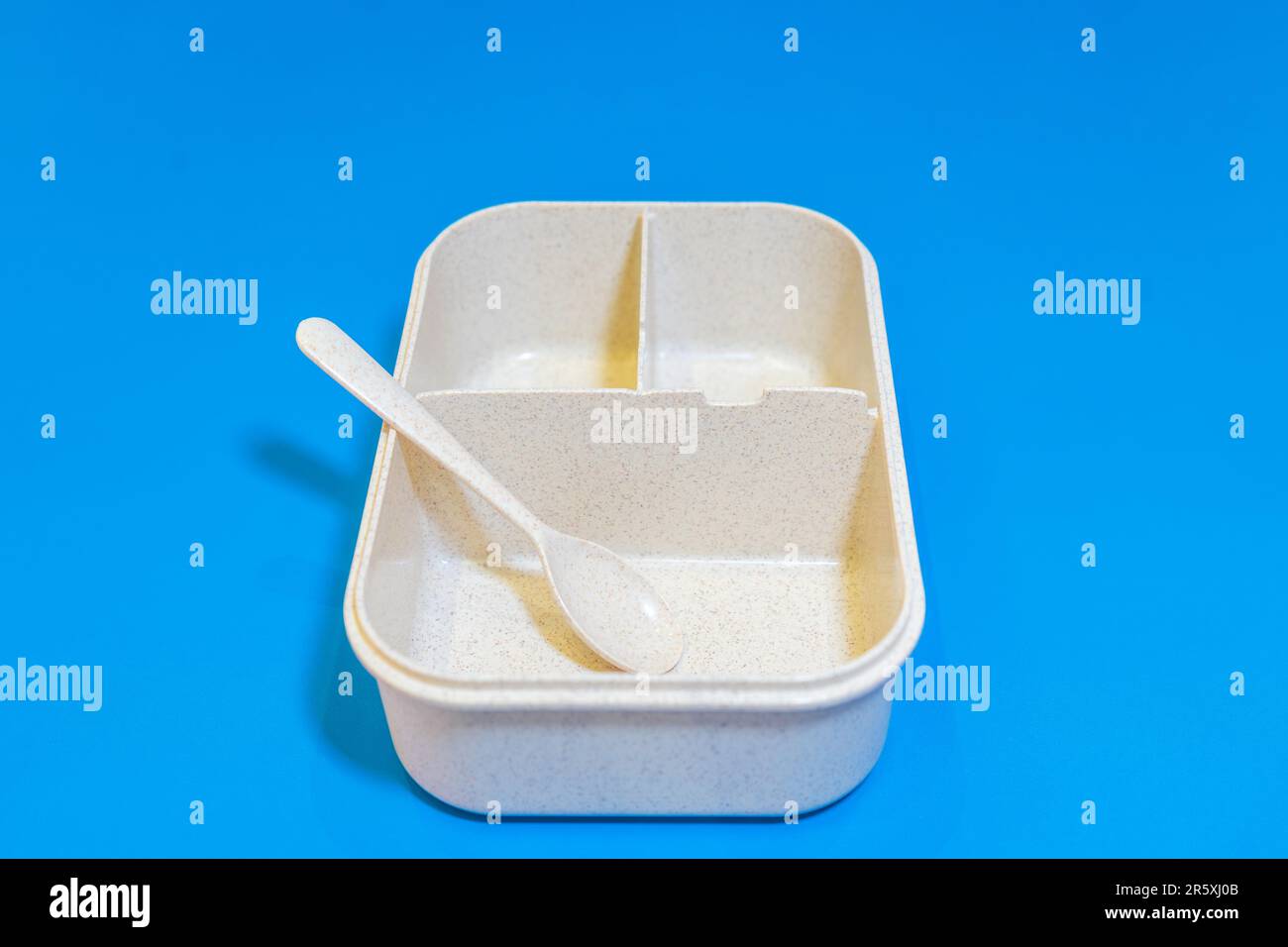 The White Lunch Box with Brown Lid and Three Compartments is a stylish