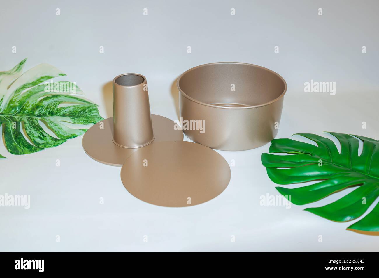 The Round Gold Cake Pan is an elegant and stylish essential for any