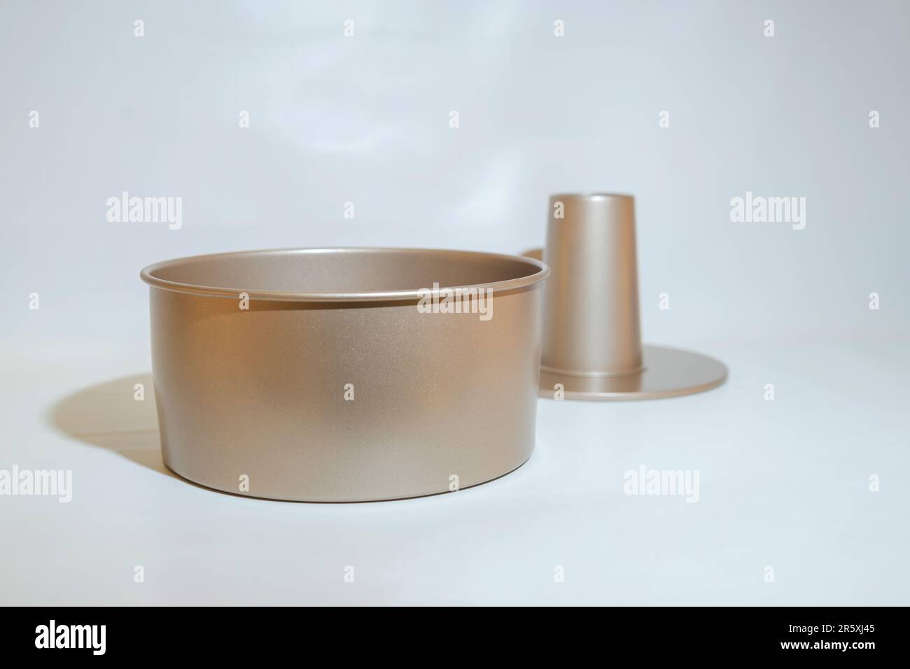 The Round Gold Cake Pan is an elegant and stylish essential for any