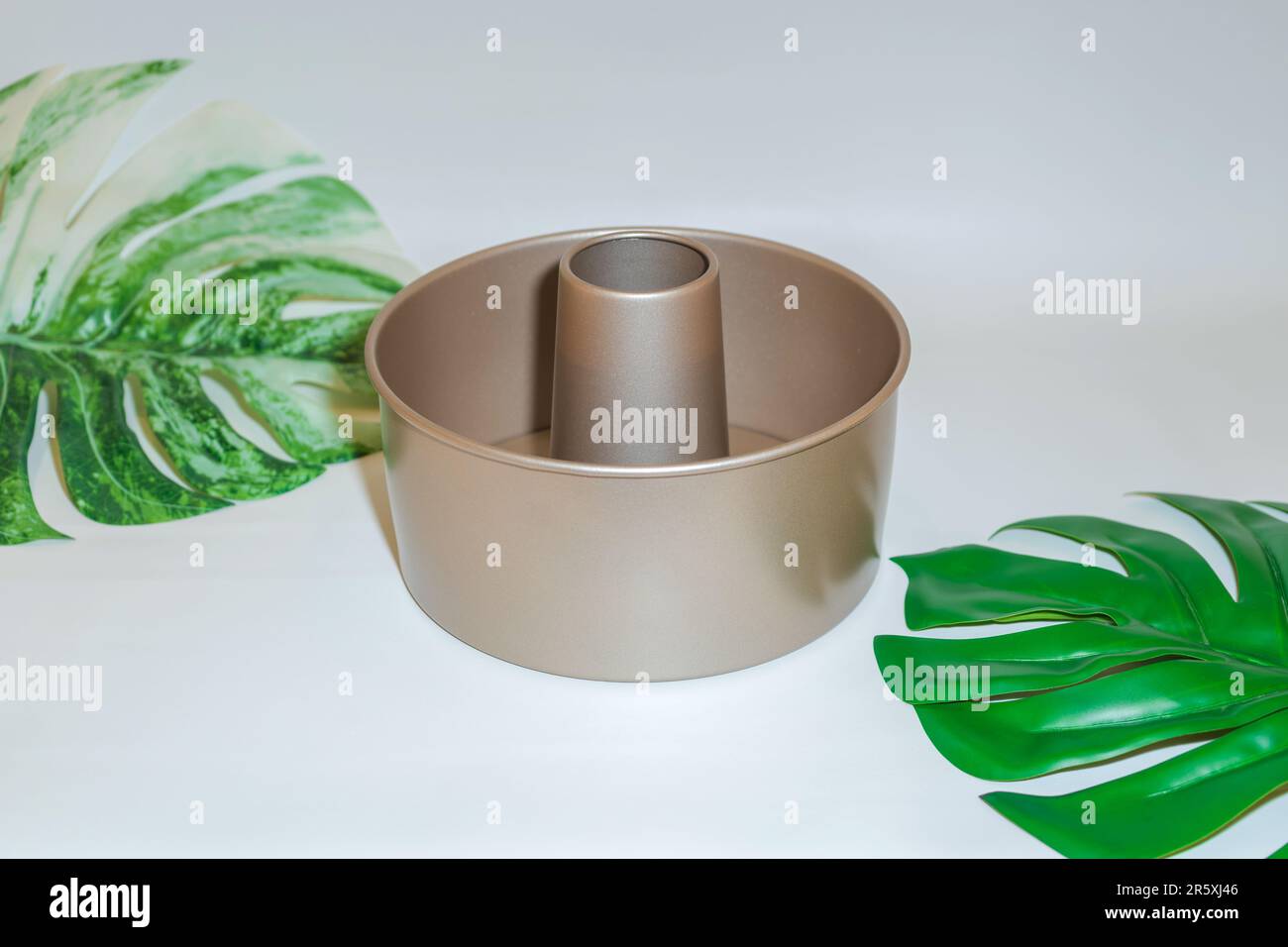 The Round Gold Cake Pan is an elegant and stylish essential for any