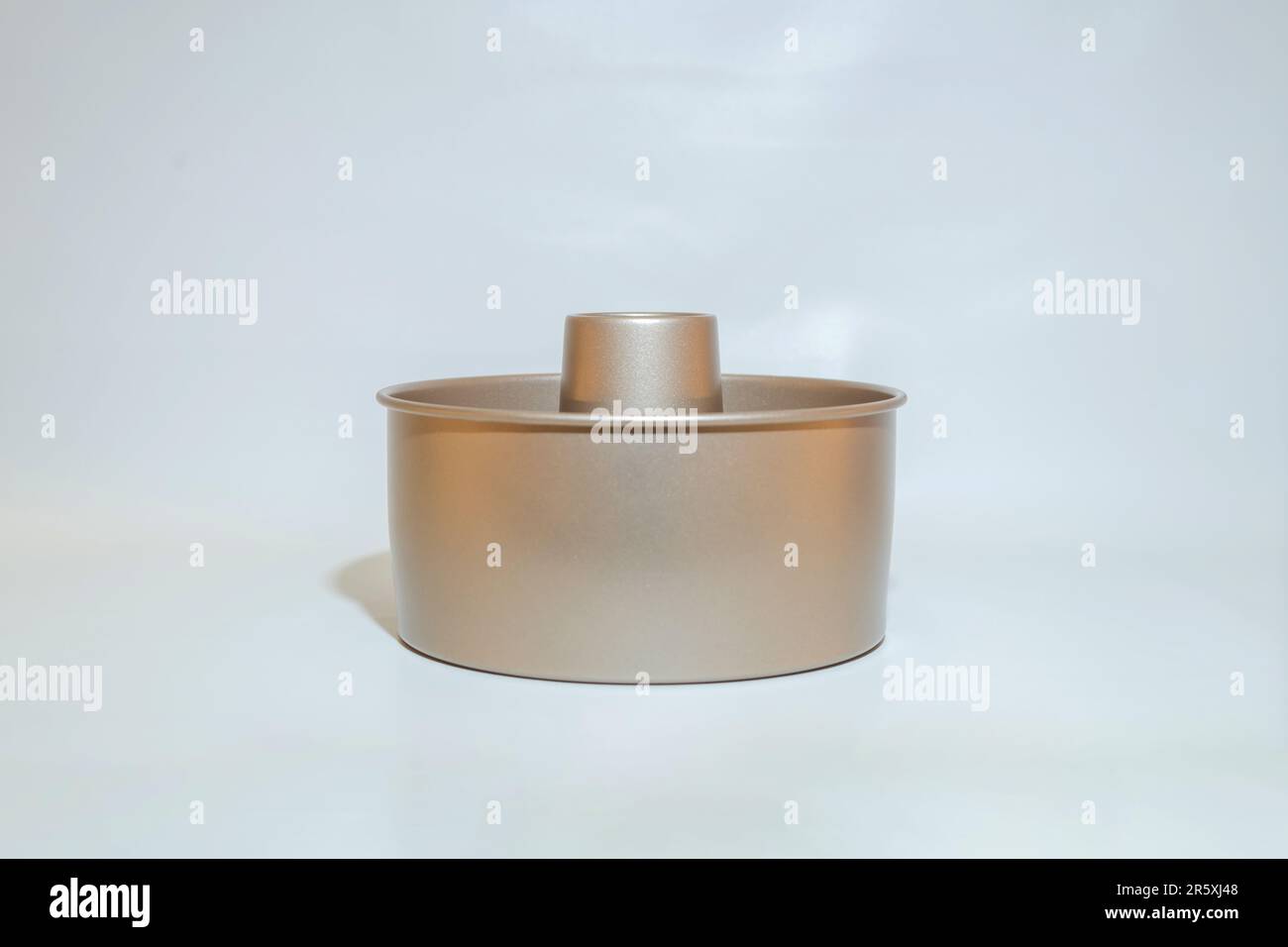 The Round Gold Cake Pan is an elegant and stylish essential for any