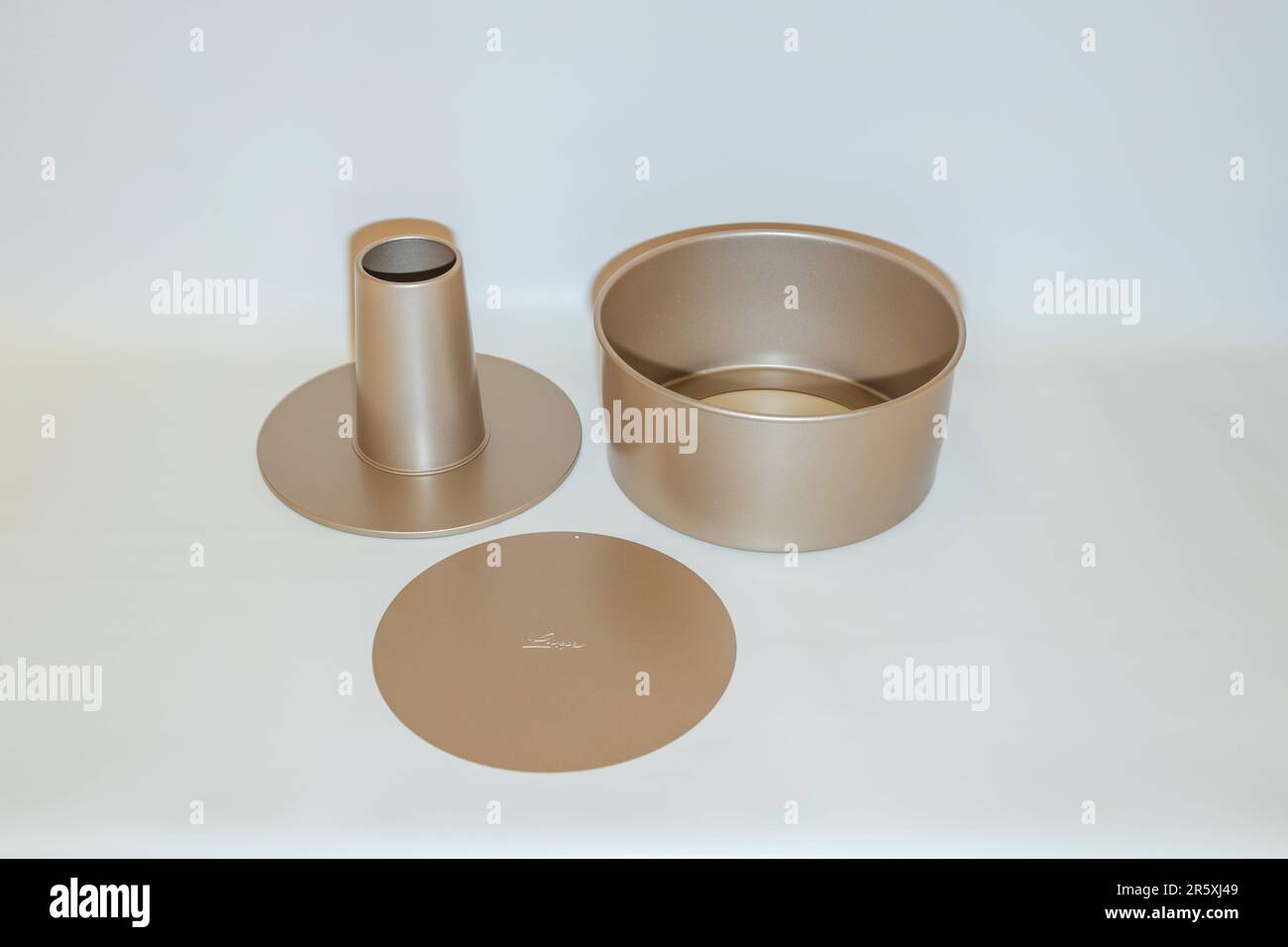 The Round Gold Cake Pan is an elegant and stylish essential for any