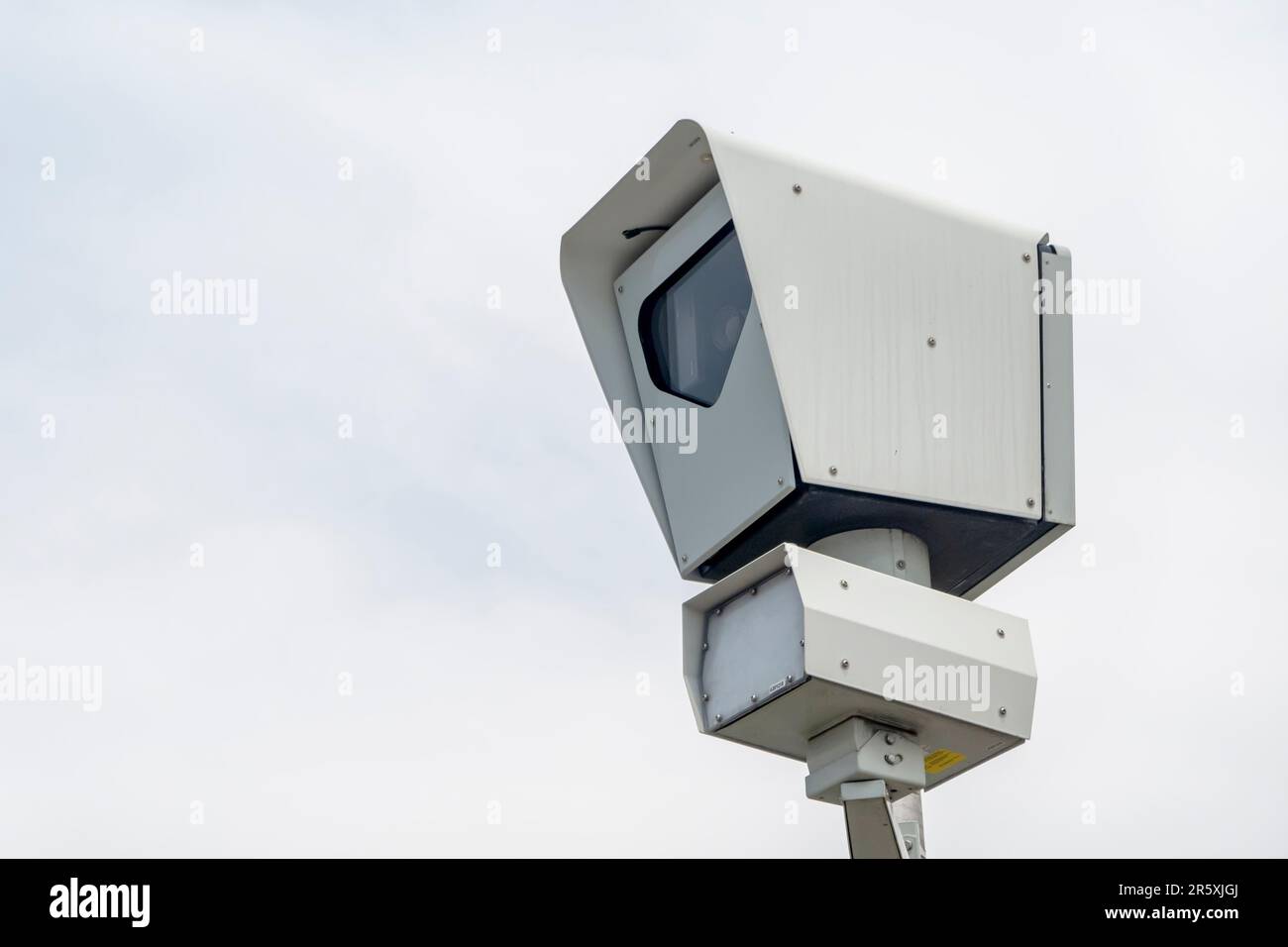 A close up to a speed traffic police camera. Automated photo enforcement used on multi-lane highways. Stock Photo