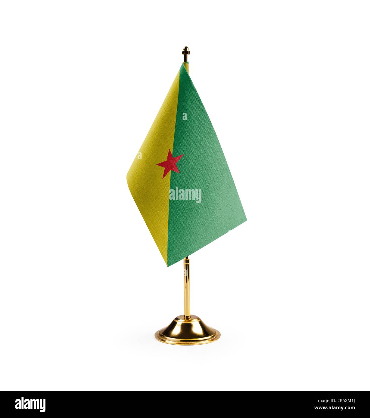 Small national flag of the French Guiana on a white background. Stock Photo