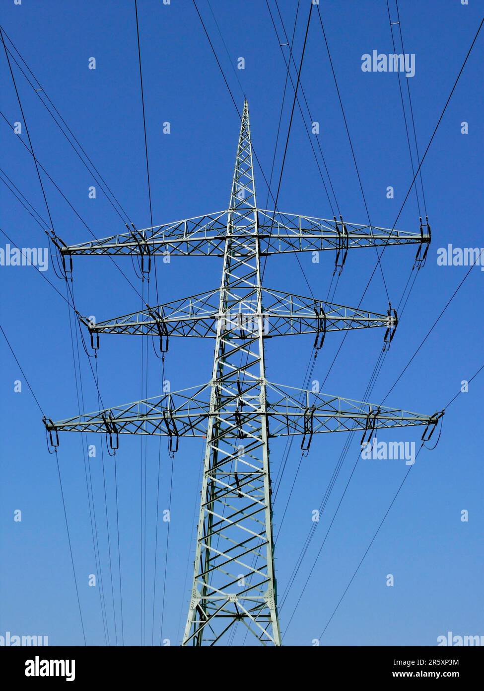 Power pylons in the field, power lines, overhead power line, supply