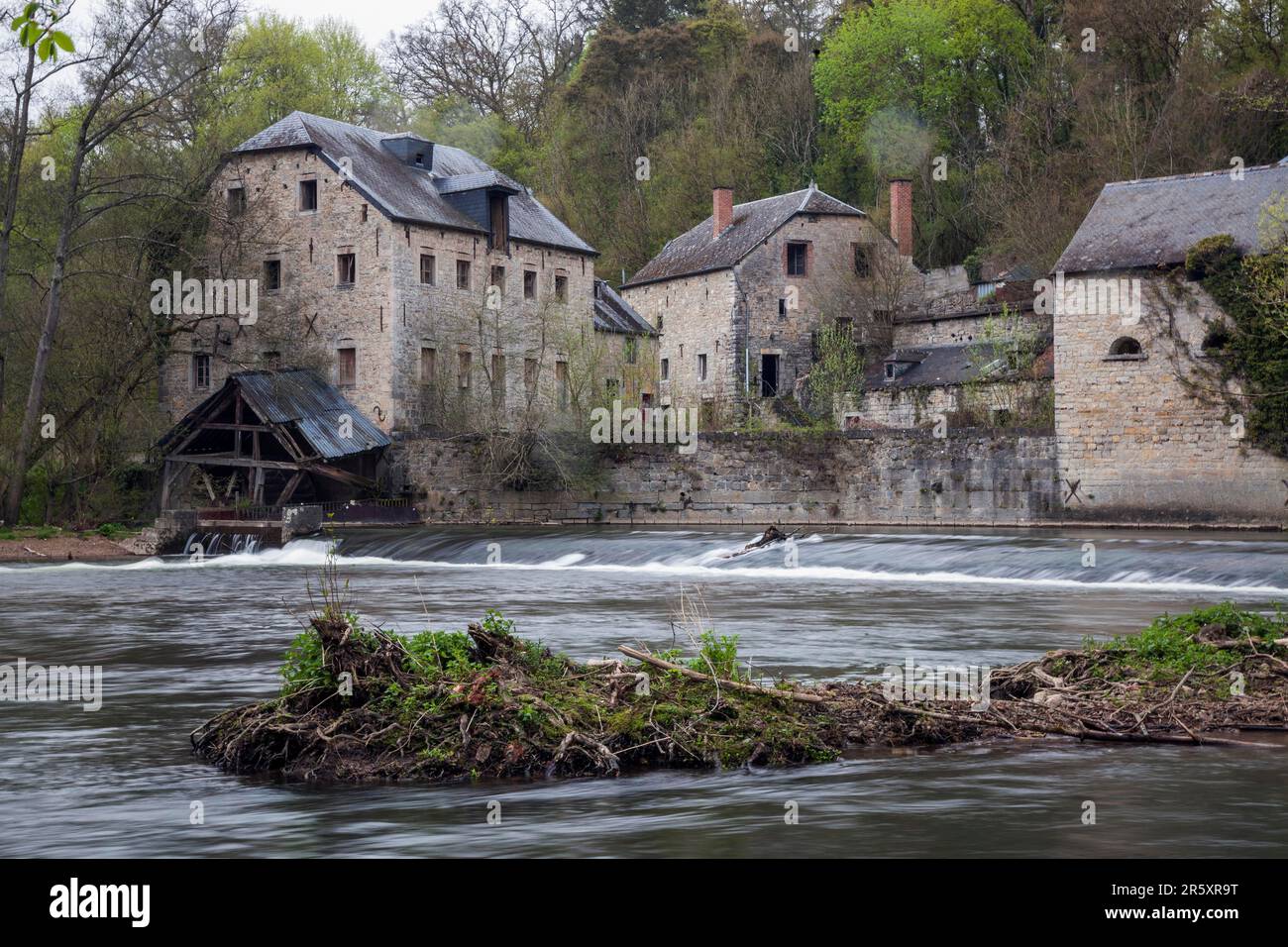 Old mill on the river Lesse near Chateau de Walzin, Namur province, Dinant region, Belgium Stock Photo