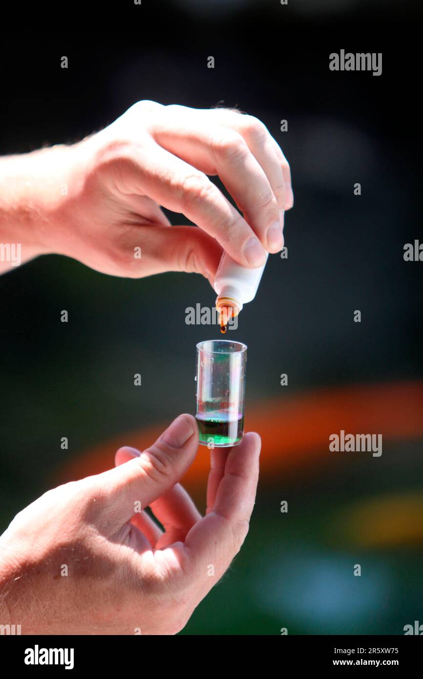 Water test to determine pH value, test water quality, water quality Stock Photo