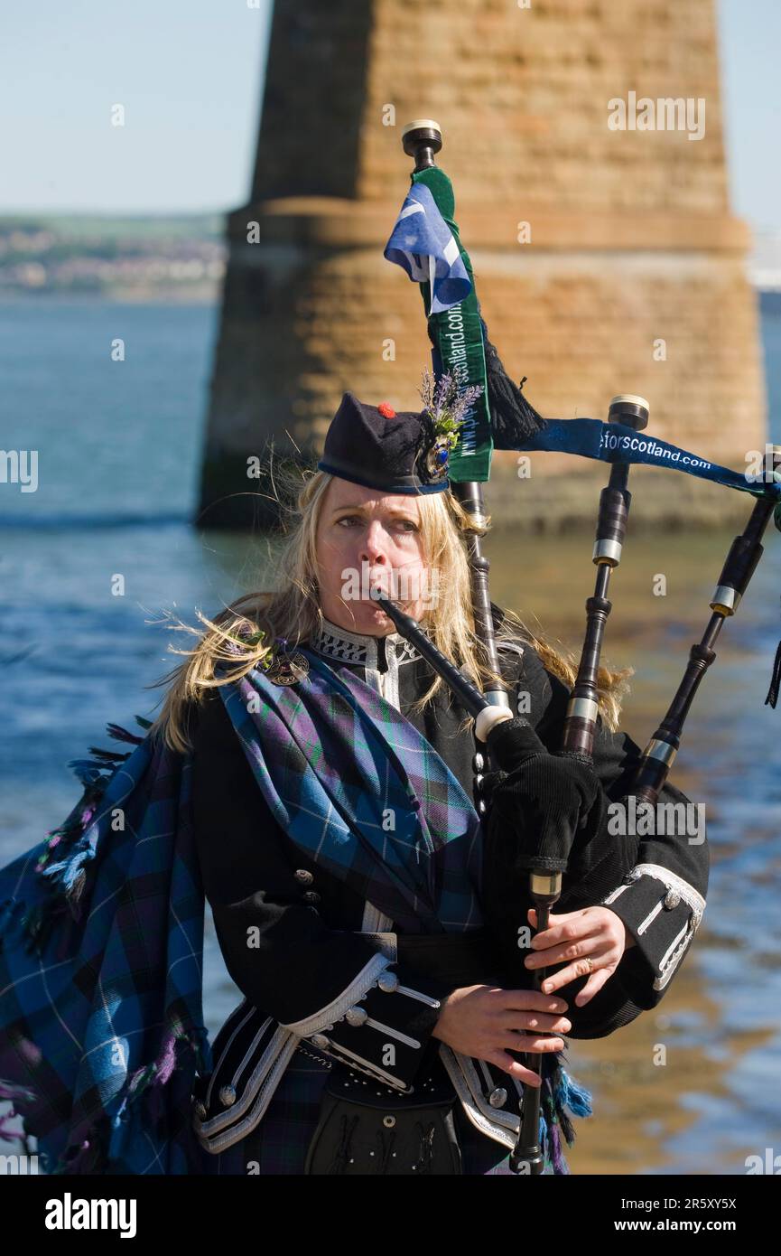 Woman in Scottish dress, with bagpipe, Scotland, United Kingdom Stock Photo