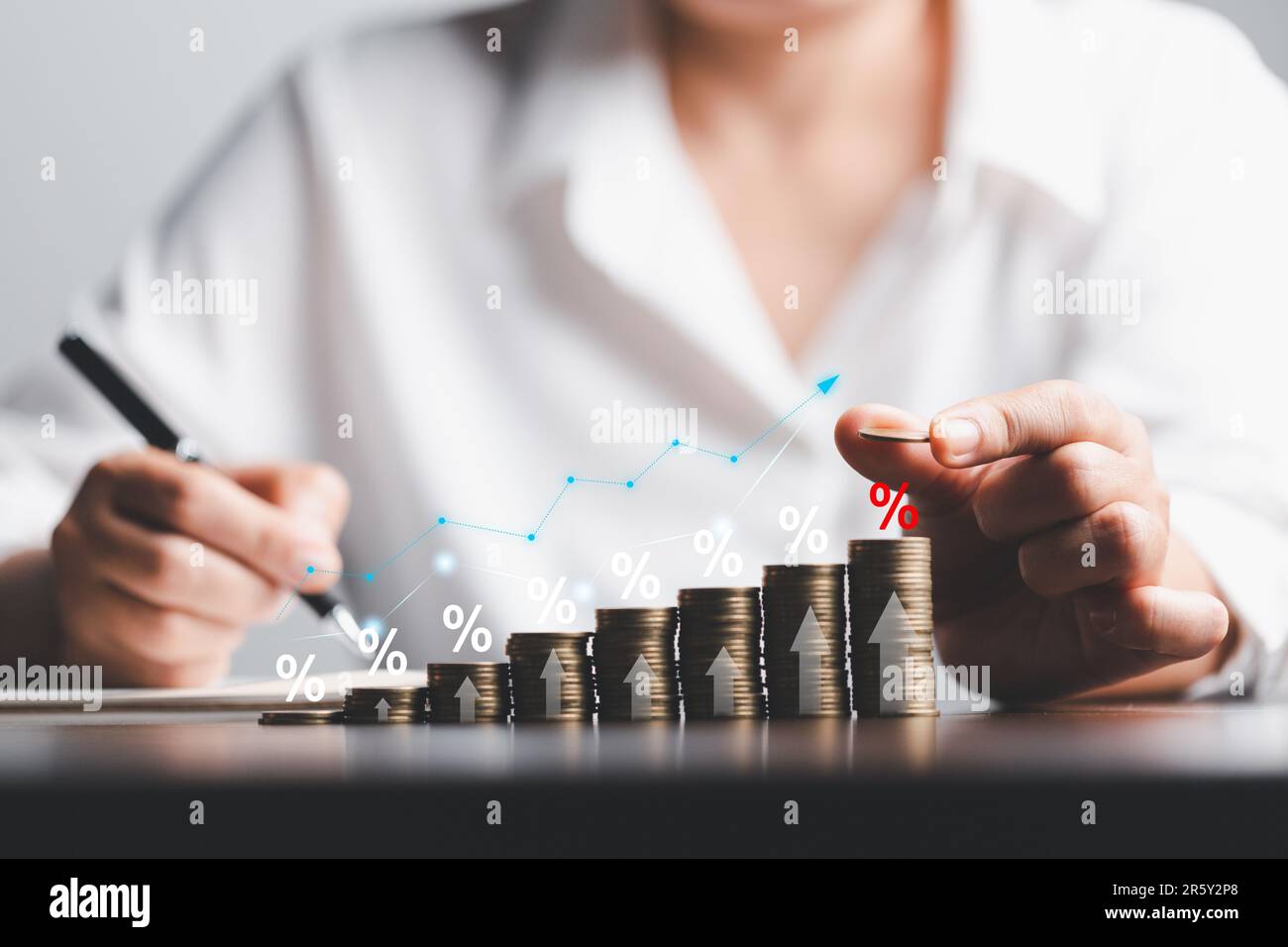 Business woman hand and stack coins money with up arrow and percentage ...