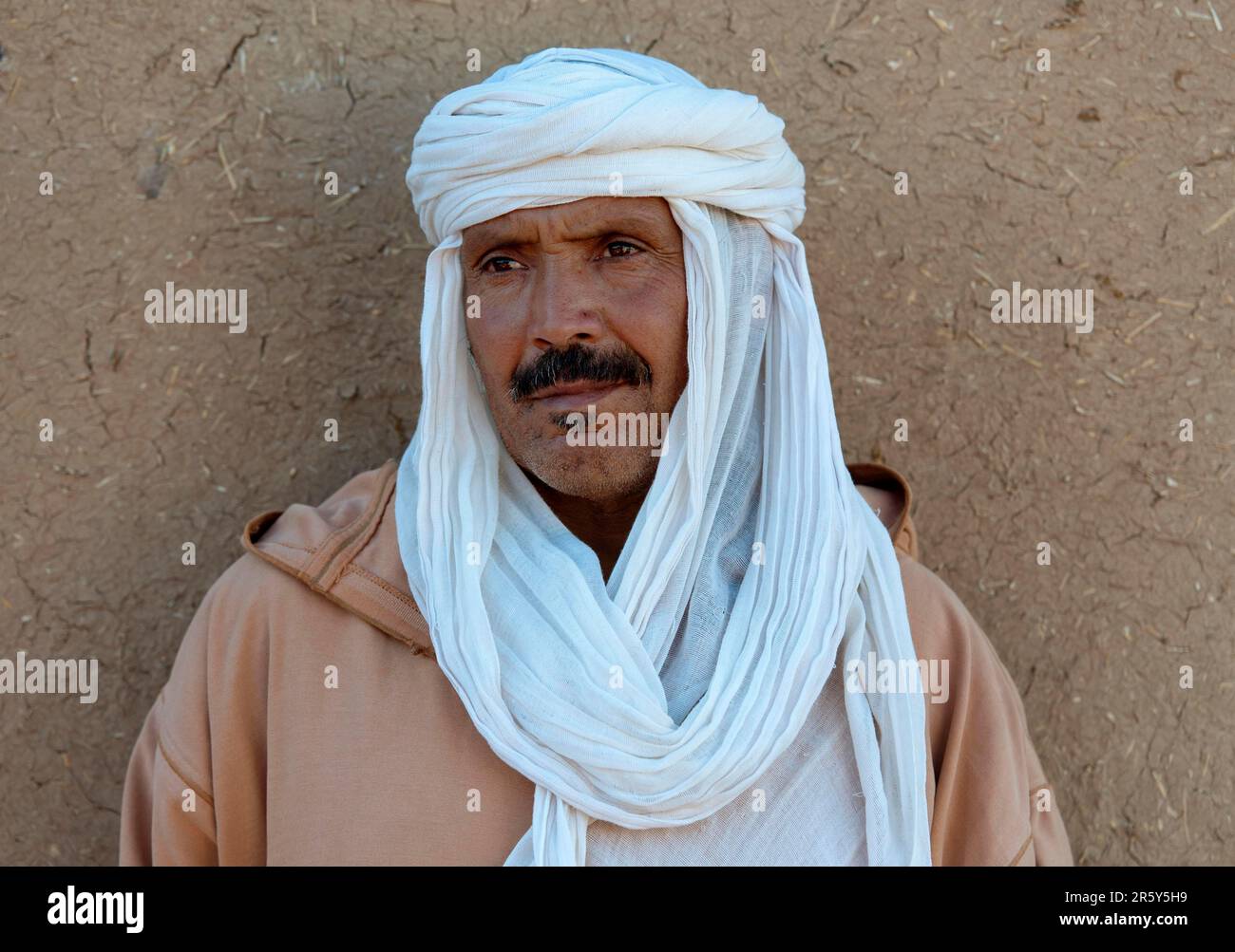 Morocco, camel driver, Berber, Erg Chebbi desert, dunes Stock Photo