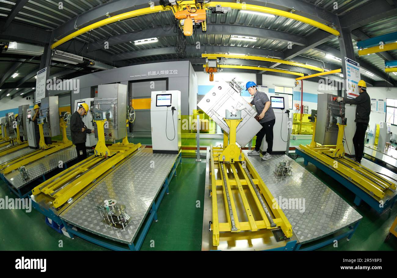 HAI'AN, CHINA JUNE 6, 2023 A worker produces high and low voltage