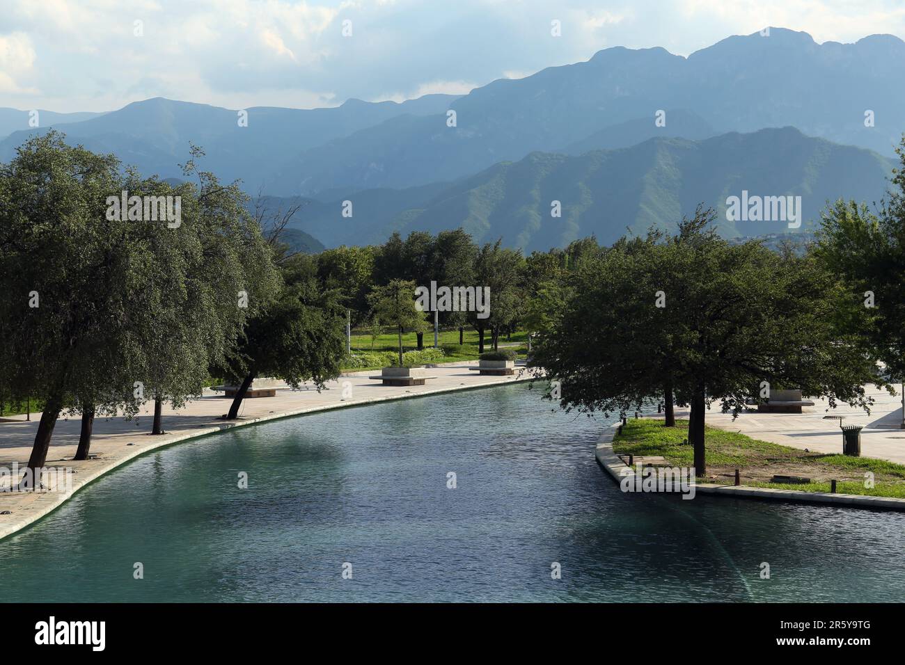 Picturesque view of canal, green trees in park Stock Photo