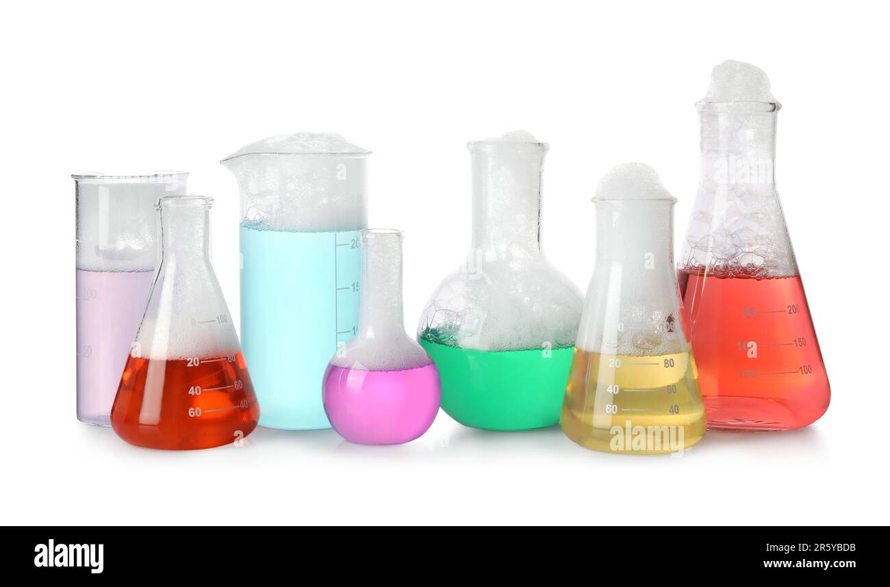 Laboratory glassware with colorful liquids isolated on white. Chemical