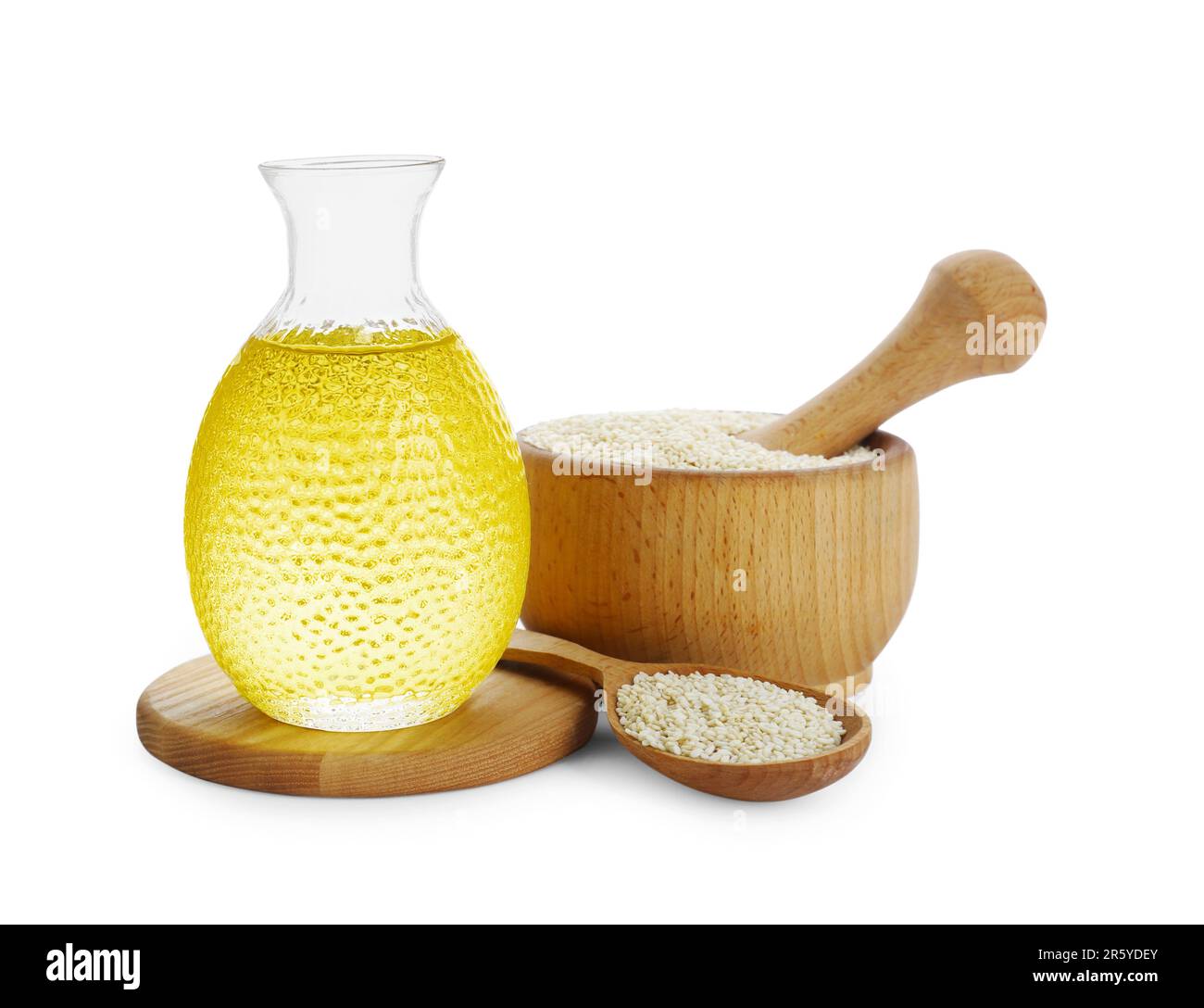 glass-bottle-of-fresh-sesame-oil-and-seeds-isolated-on-white-stock