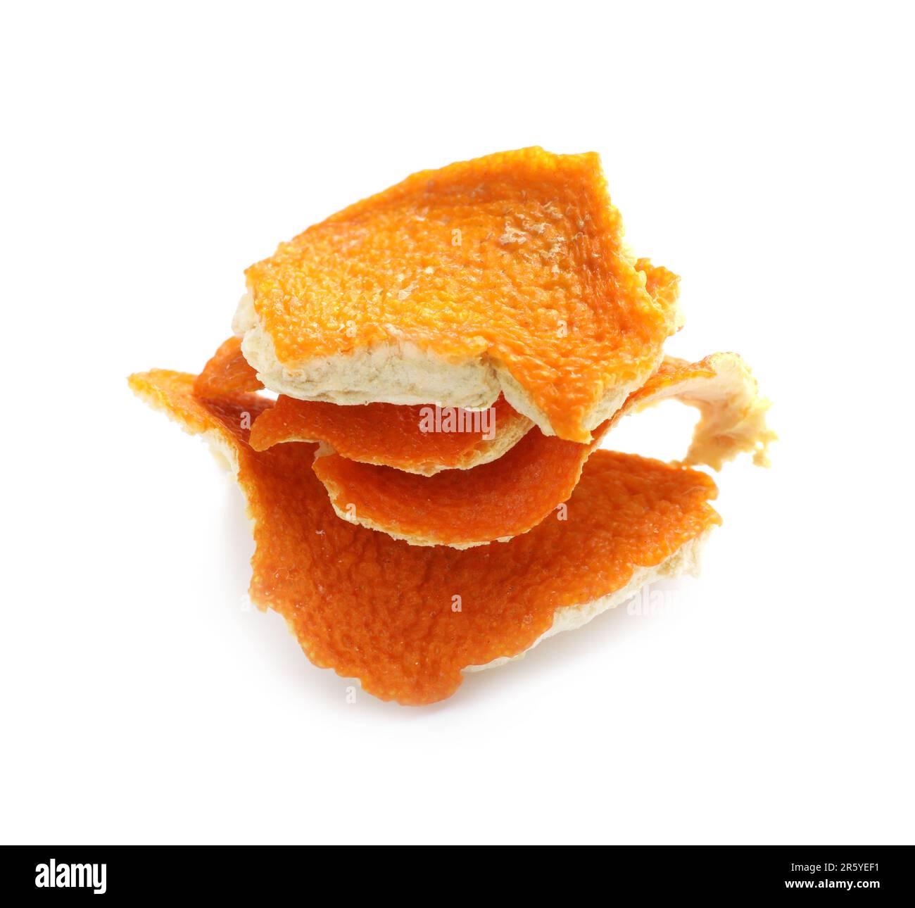 Dry orange fruit peels on white background Stock Photo - Alamy