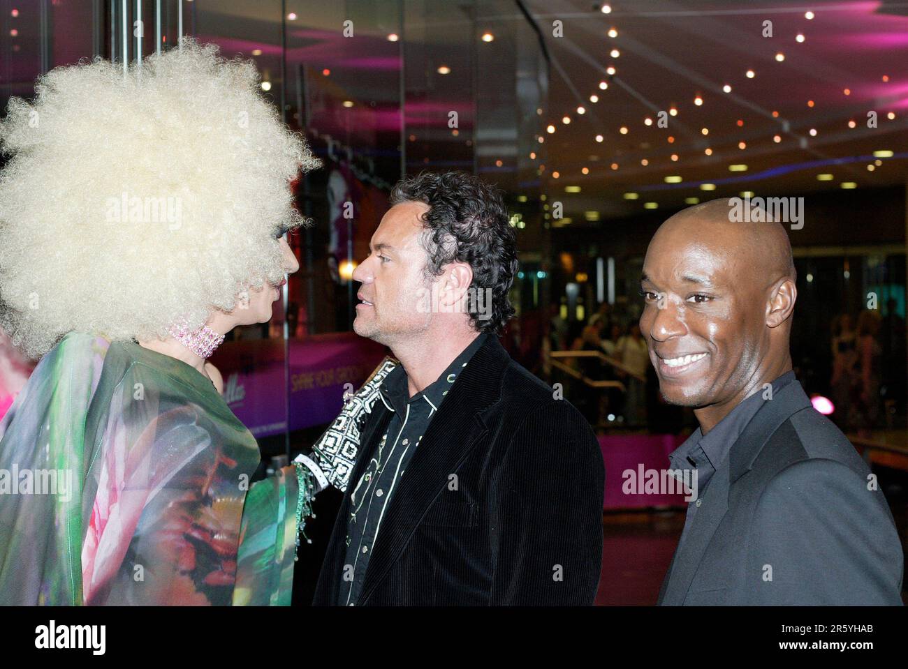 Drag artist Claire De Lune (left) with Tim Chappell (centre, costume