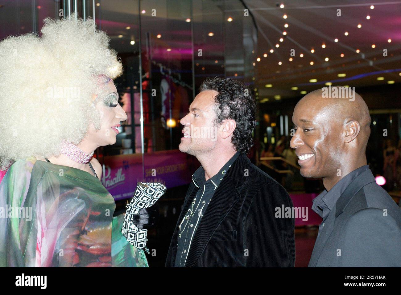 Drag artist Claire De Lune (left) wth Tim Chappell (centre, costume