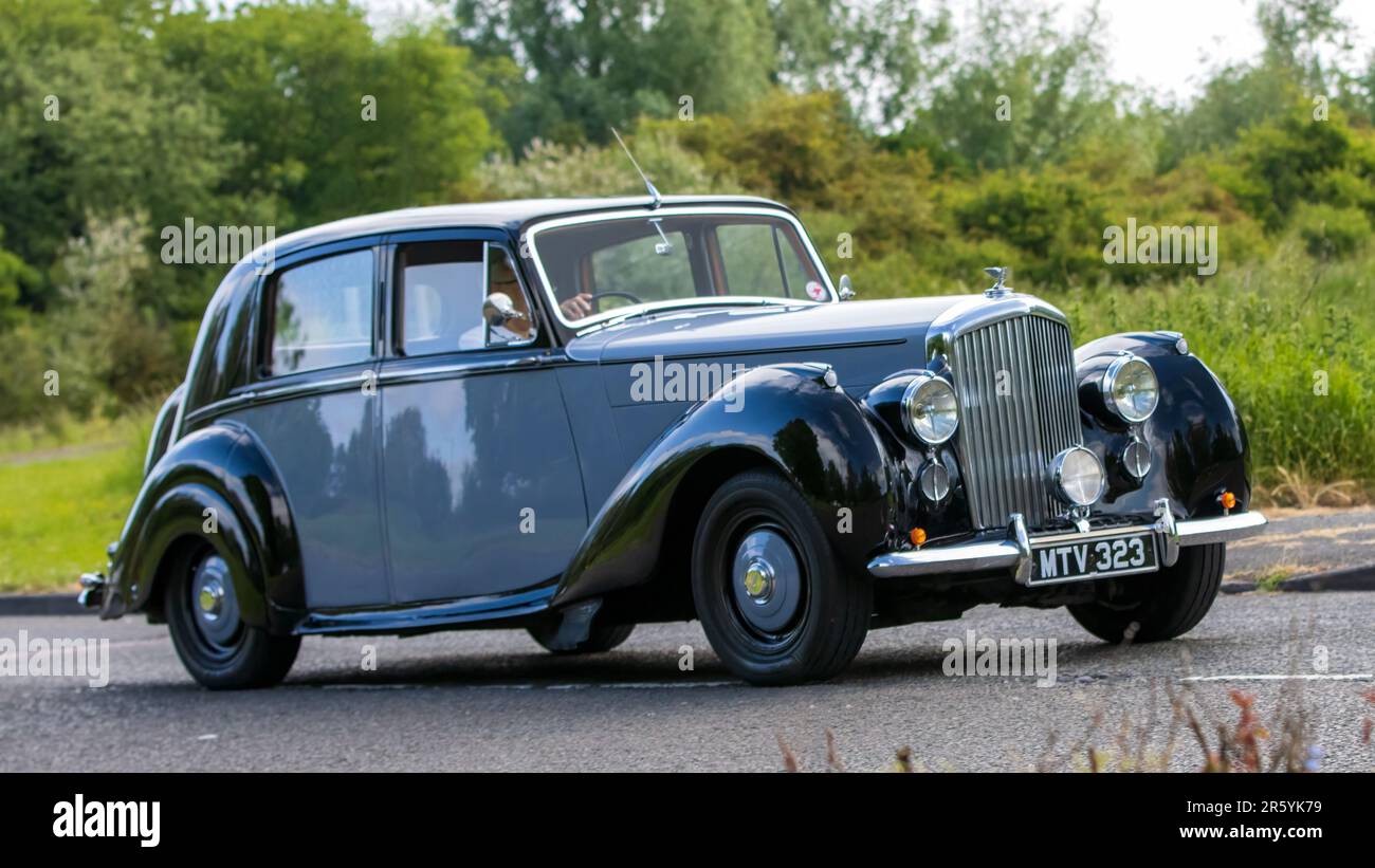 Stony Stratford,UK - June 4th 2023: 1950 BENTLEY MK6 classic car travelling on an English country road. Stock Photo
