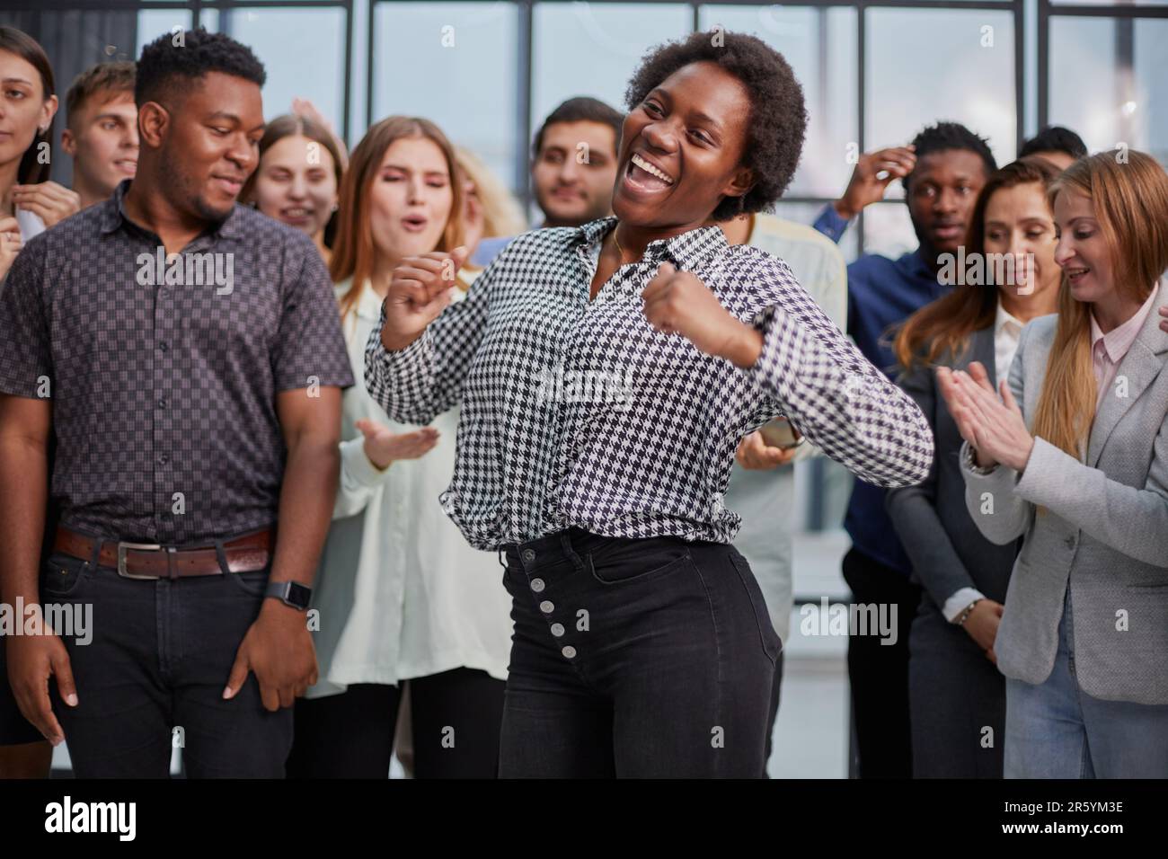 Business team celebrating a triumph with arms up Stock Photo - Alamy