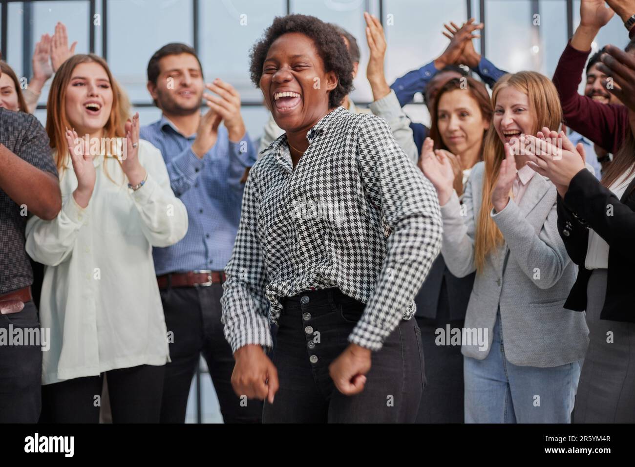 Business team celebrating a triumph with arms up Stock Photo - Alamy