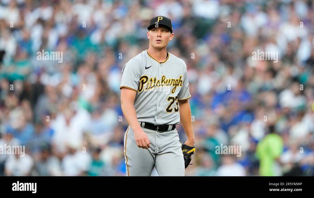 Pittsburgh Pirates starting pitcher Mitch Keller walks off the field