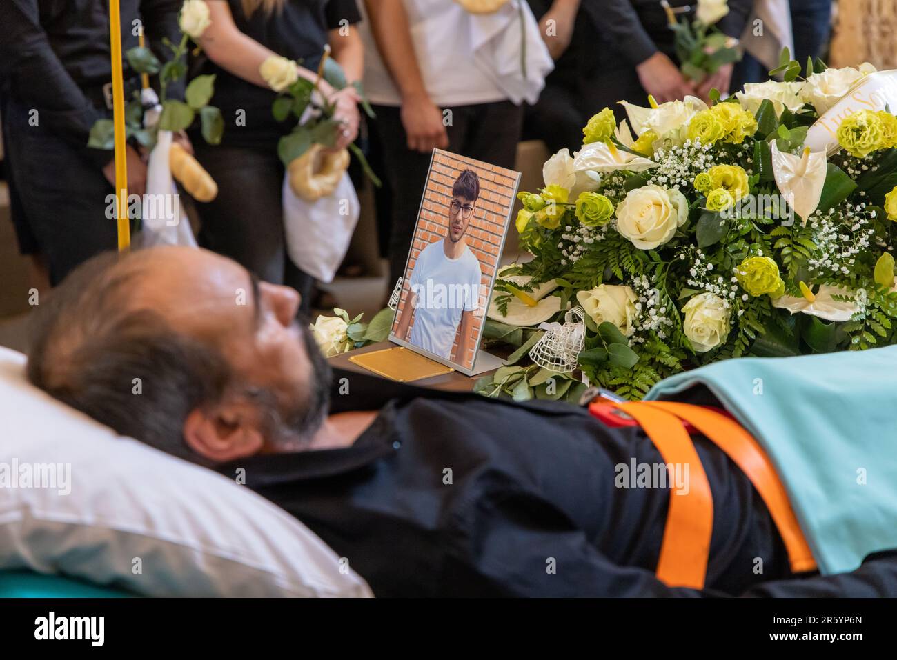 Fanel Pricopi, a 50-year-old man from Romania, attends the funeral of ...