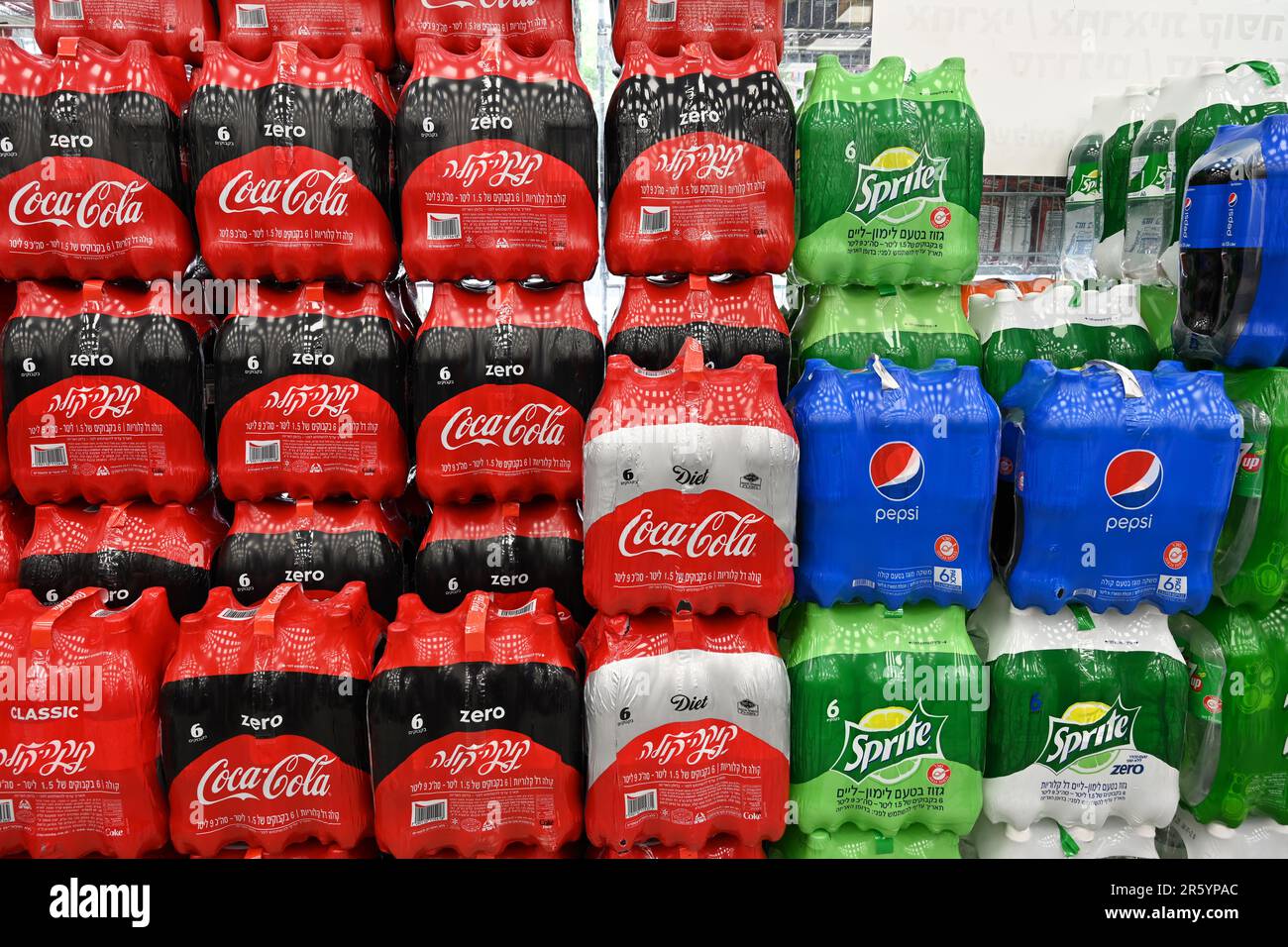 Stacked Soft drinks in a store Stock Photo