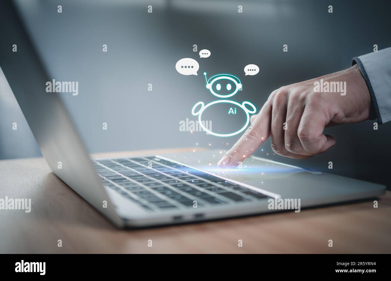 People are working and bringing AI to help them work on computers Stock ...
