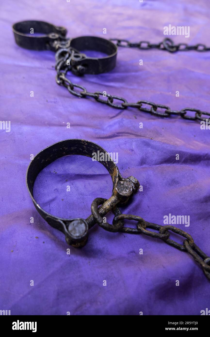 Iron handcuffs with chains, medieval torture, inquisition Stock Photo