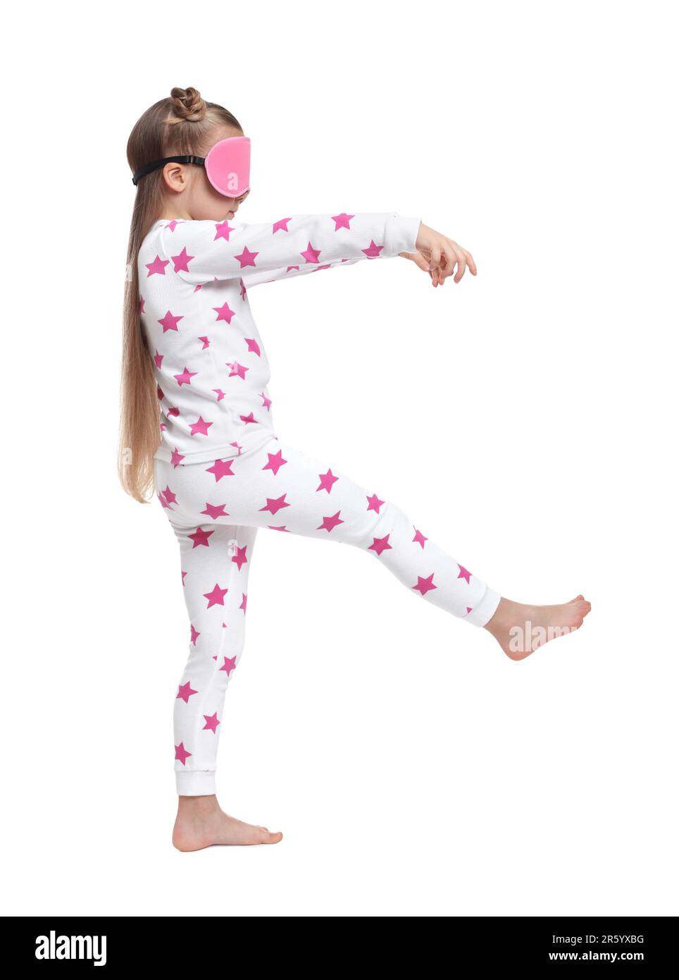 Girl in pajamas and sleep mask sleepwalking on white background Stock Photo Alamy