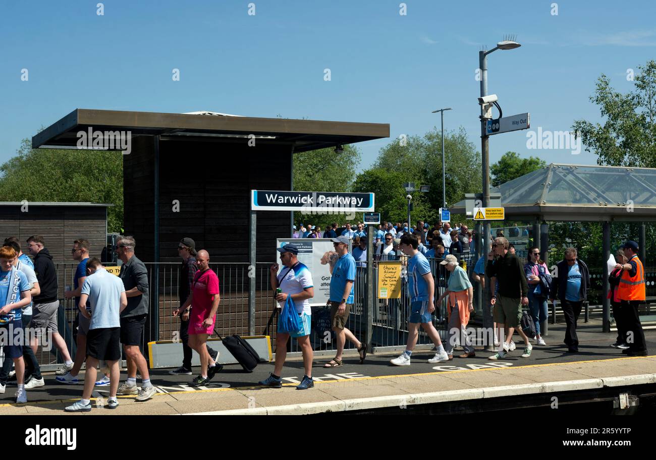 Coventry City football fans at Warwick Parkway station waiting for a train to Wembley Stadium for the Championship League play-off. Stock Photo