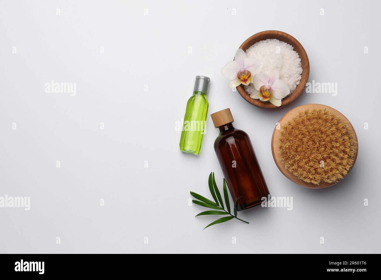 Flat lay composition with different spa products on white background ...