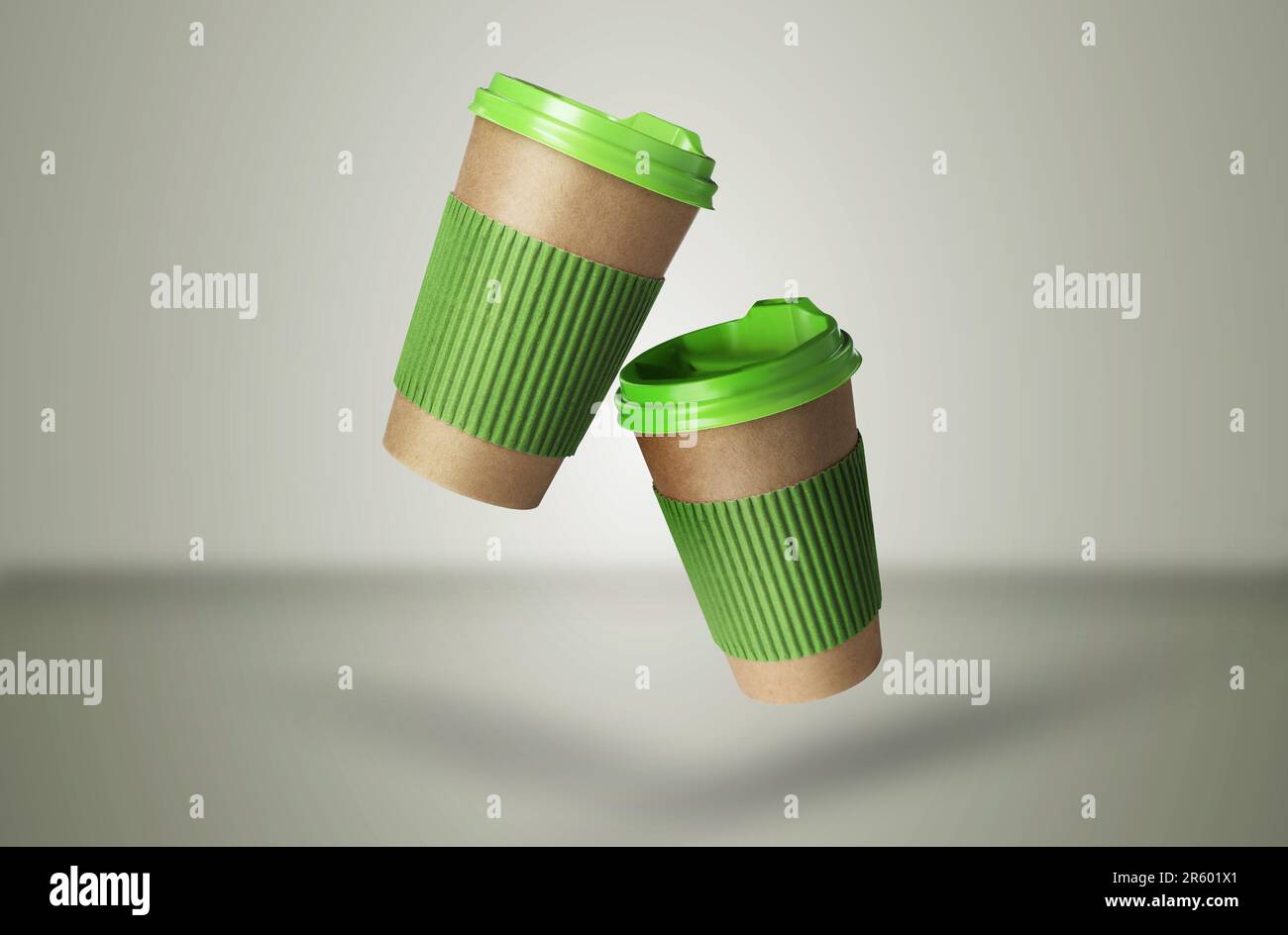 Takeaway paper cups falling on color background Stock Photo - Alamy