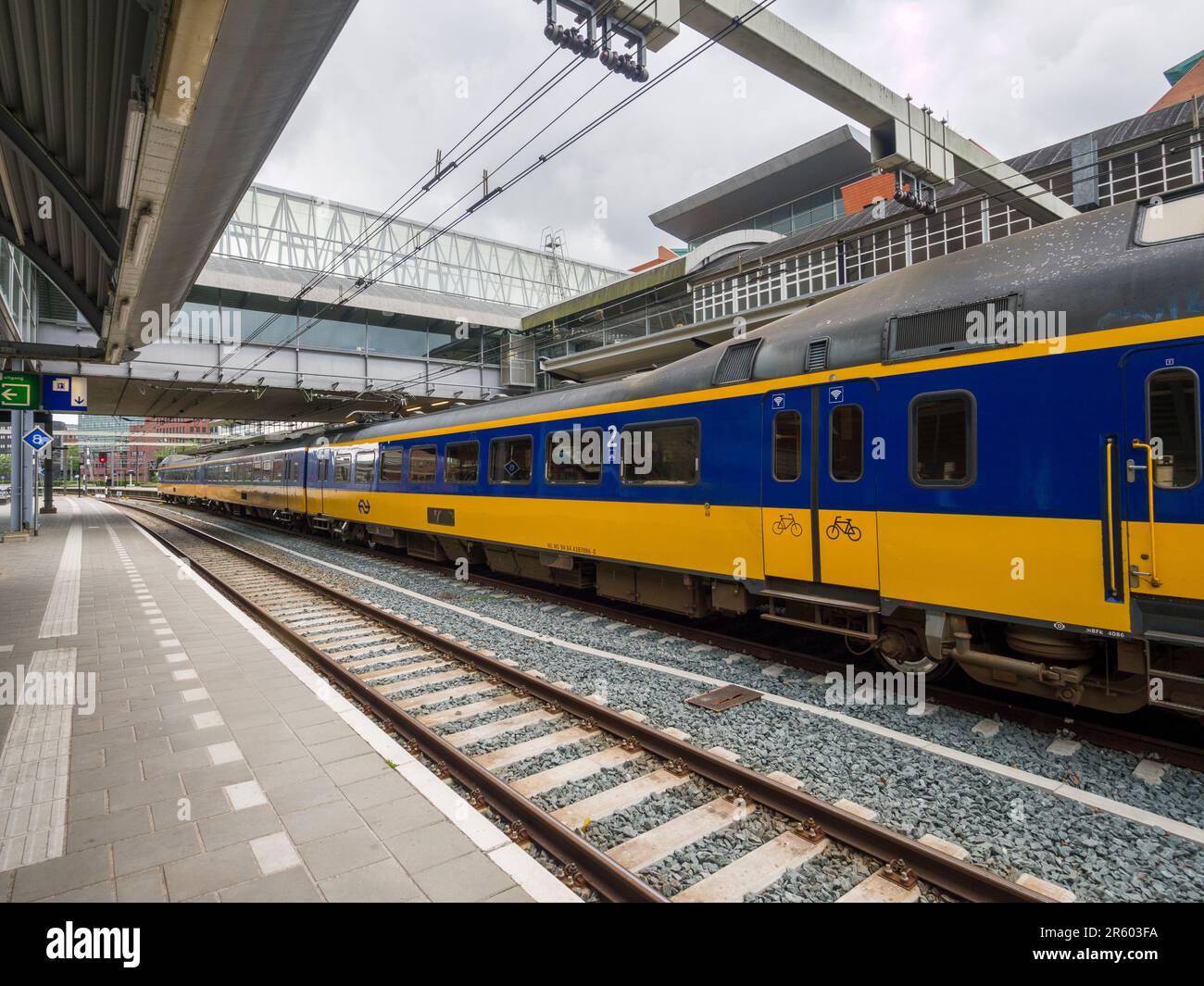An NS (Dutch Railways) passenger train at Amersfoort Central railway station, Netherlands, Europe. Stock Photo