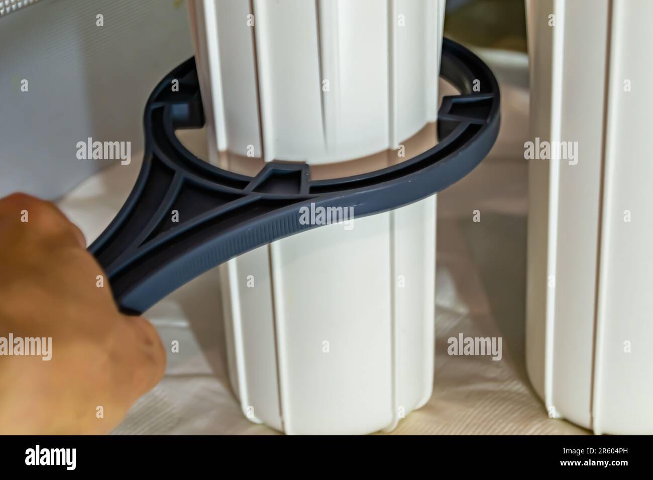 Photography to theme water filter cartridge for home on background kitchen, photo consisting of installing water filter cartridge to home, replacement Stock Photo
