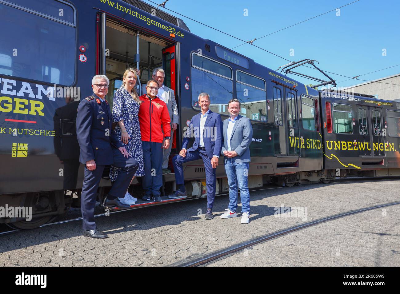 Düsseldorf, Germany, 06.06.2023. l-r Brigadegeneral Alfred Marstaller (Project manager, Invictus Games), Annette Grabbe (CFO), Michael Richarz (Technical Manager), competitor Seargent Milan A., Düsseldorf Mayor Joseph Hinkel and Martin Ammermann (Project manager Invictus Games). Düsseldorf transport network Rheinbahn presents an Invictus Games 2023 branded Tram. The games take place in the city in September 2023. Credit: newsNRW / Alamy Live News Stock Photo