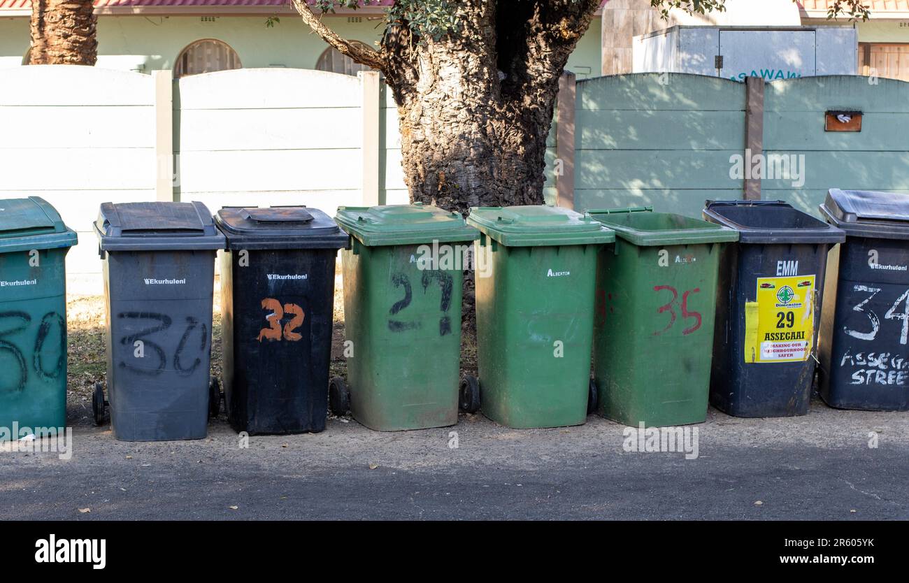 Johannesburg, South Africa residential refuse bins lines up to be collected by the