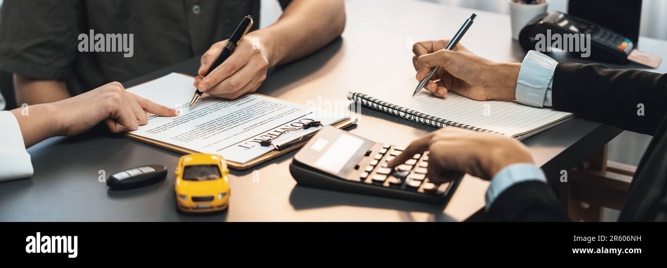 Car dealer calculate interest rate and costs of car loan with