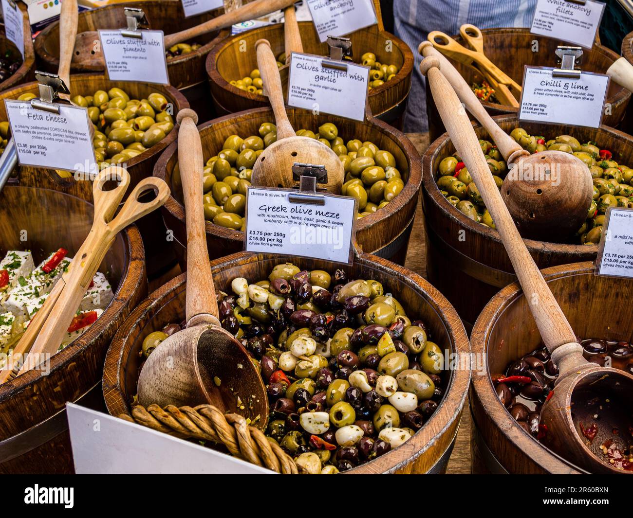 Tubs of organic olives for sale on the market in Salisbury, England. Stock Photo