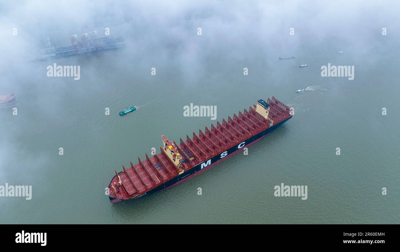 SUZHOU, CHINA - JUNE 6, 2023 - MSC MARIELLA, the world's largest newly built container ship, starts its sea trial with the help of tug boats in Suzhou Stock Photo