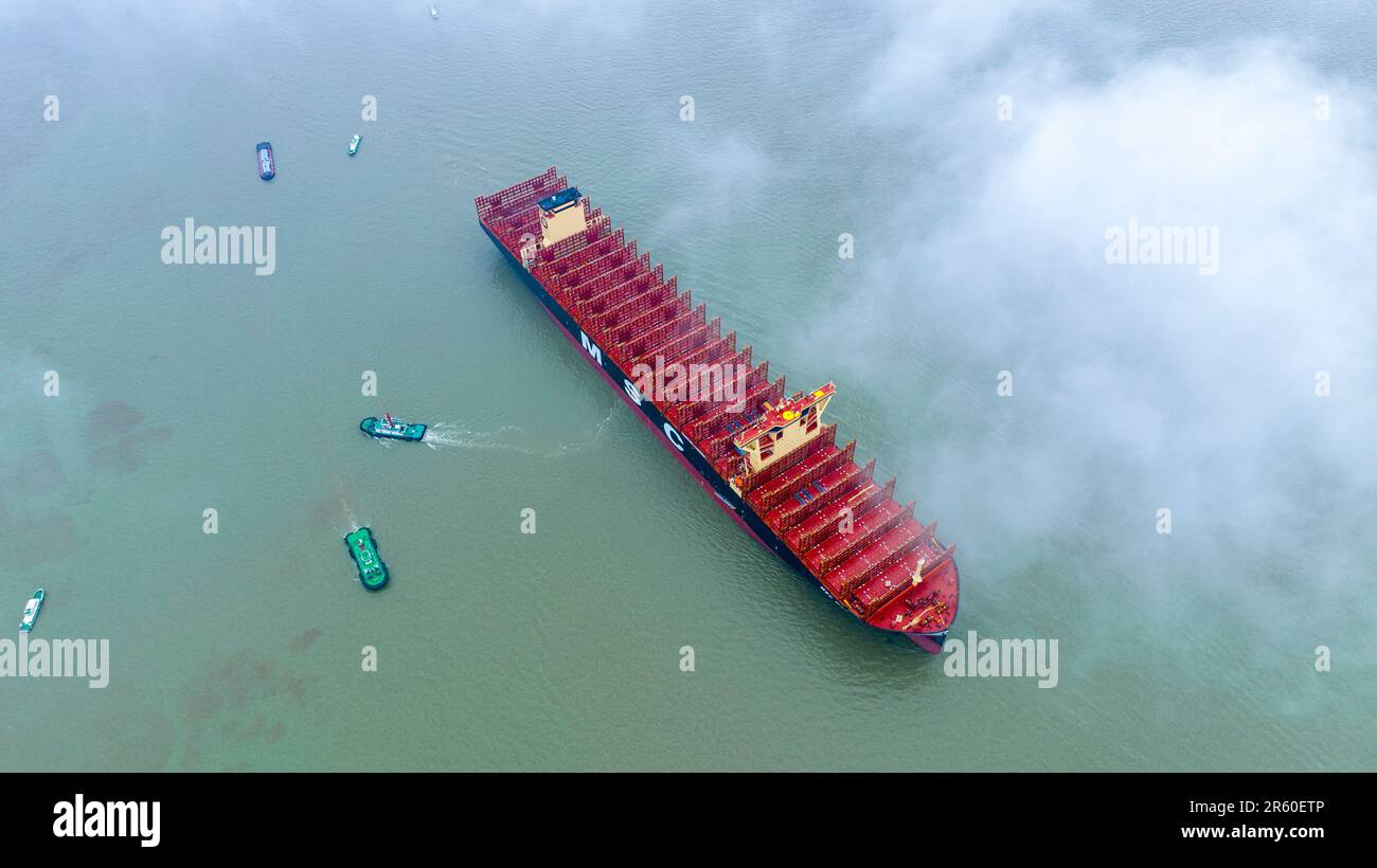 SUZHOU, CHINA - JUNE 6, 2023 - MSC MARIELLA, the world's largest newly built container ship, starts its sea trial with the help of tug boats in Suzhou Stock Photo