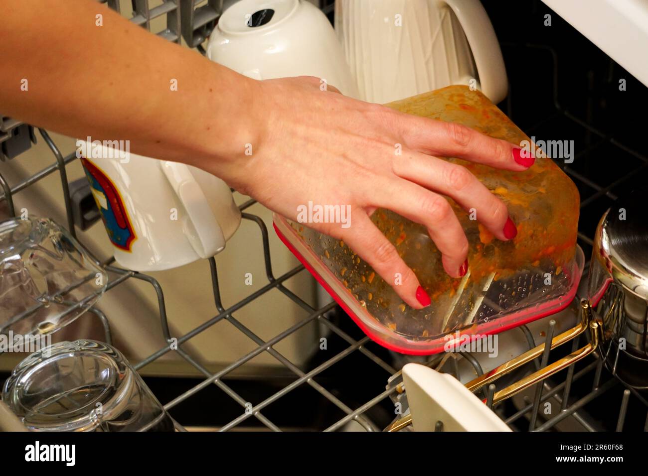 Dirty dishes in the dishwasher close up view Stock Photo Alamy