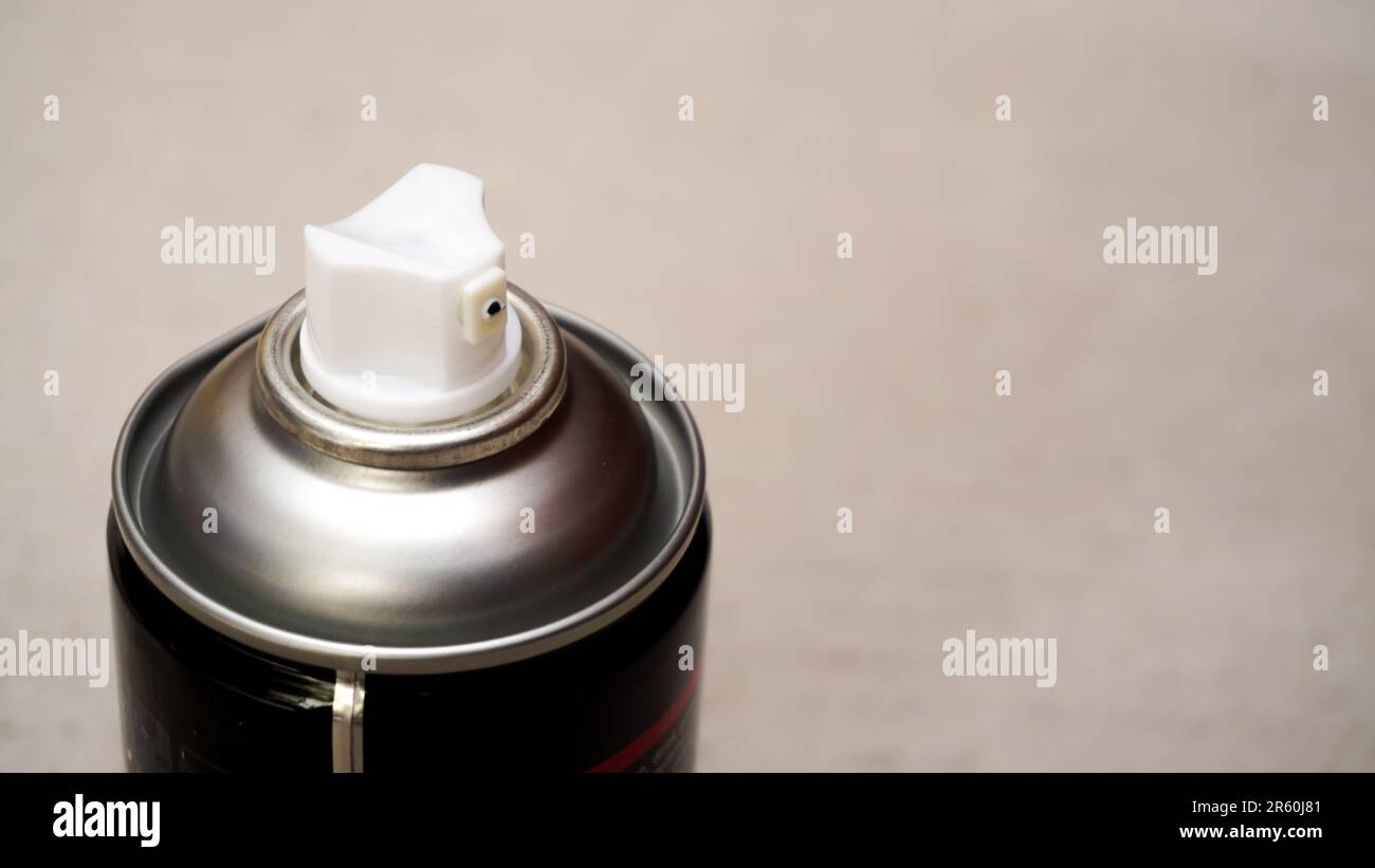 Spray paint can nozzle close up view Stock Photo