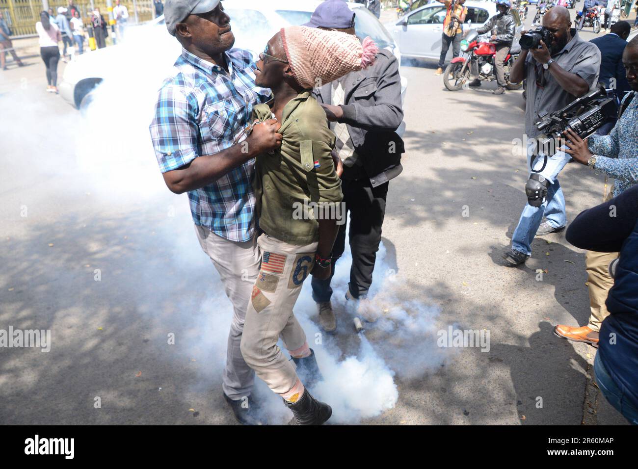 Nairobi, Kenya. 06th June, 2023. The undercover police officers arrest an  activist within the Nairobi's Central Business District (CBD) during a  demonstration against the financial bill 2023 that if passed will see