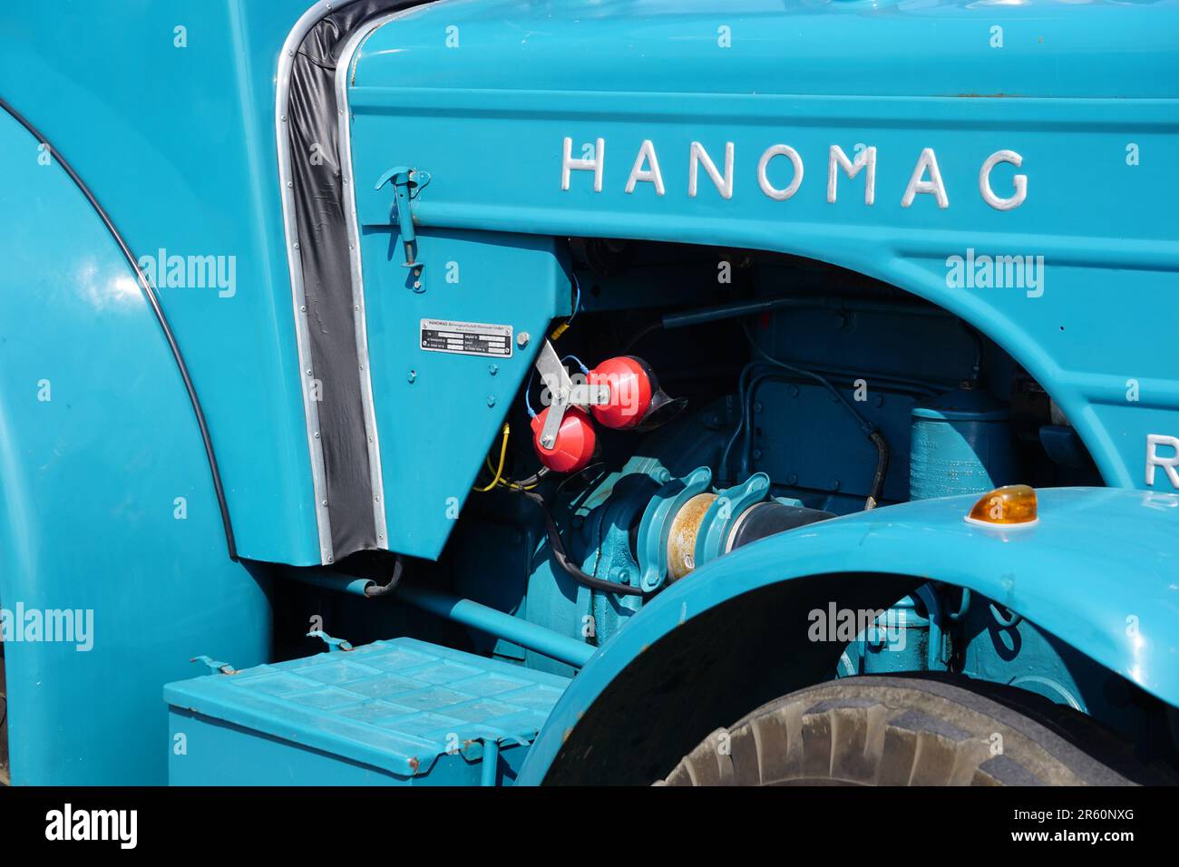 A blue Hanomag tractor in sunlight Stock Photo