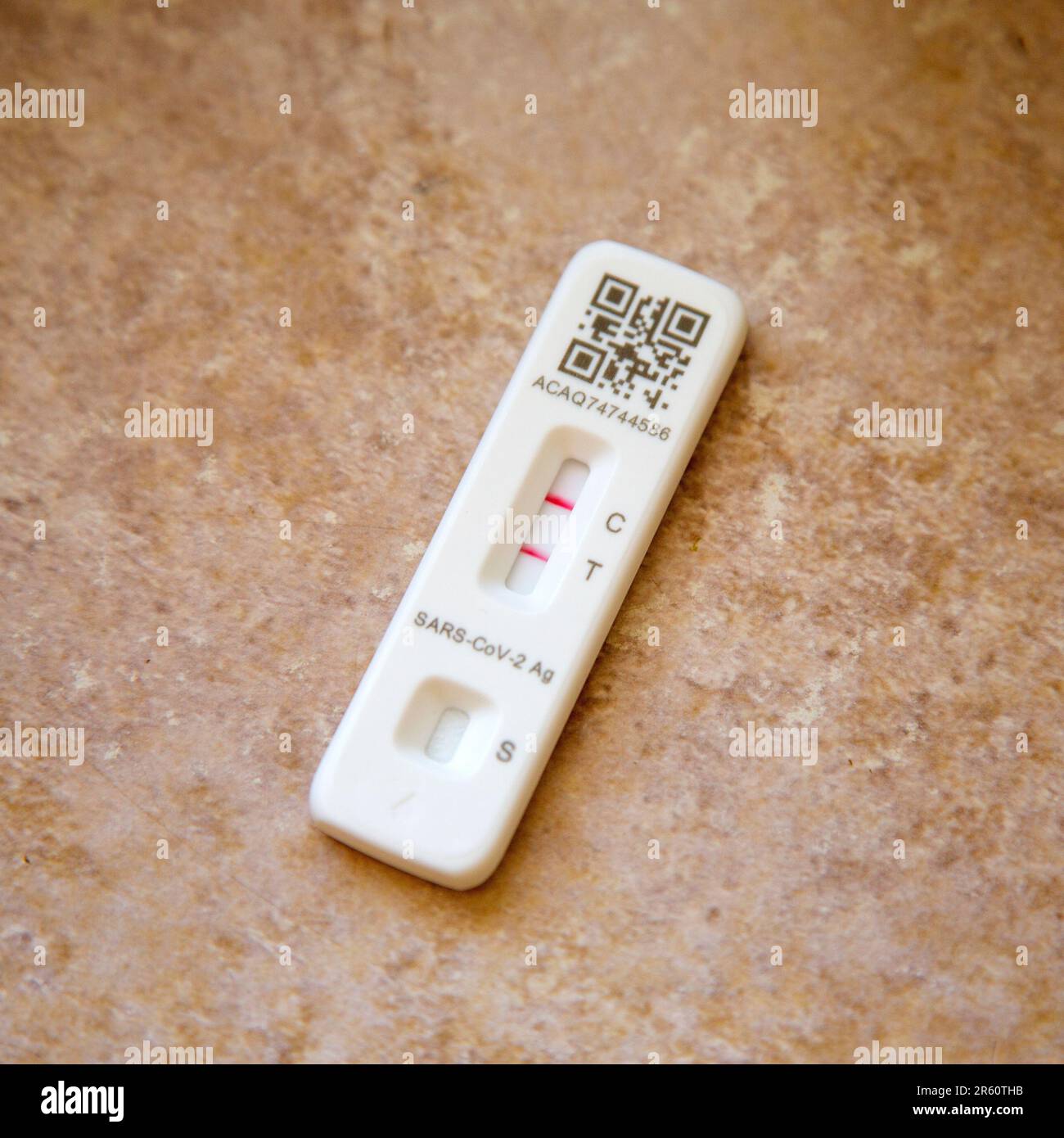 Positive lateral flow covid test. Stock Photo