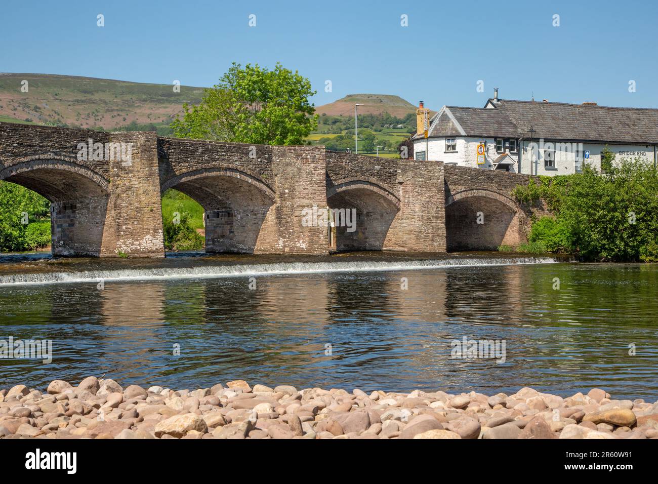 The river Usk flowing under the ancient Crickhowell Bridge in the South ...